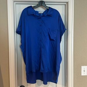 Royal blue high low button up top.
